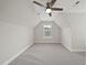 A charming bedroom features an airy window with natural light, and a ceiling fan for comfort at 622 Lone Pine Loop, Fuquay Varina, NC 27526