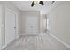 Bright bedroom with ceiling fan, closet, and plush carpeting offers a relaxing retreat at 622 Lone Pine Loop, Fuquay Varina, NC 27526