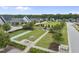 A well-maintained community park features a playground, picnic tables, shuffleboard, and green space, perfect for outdoor activities at 622 Lone Pine Loop, Fuquay Varina, NC 27526