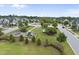 Neighborhood park featuring a playground, picnic tables, and well-maintained landscaping and nearby homes at 622 Lone Pine Loop, Fuquay Varina, NC 27526
