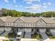 Aerial view of new townhome construction neighborhood featuring gray exterior elevations at 716 Jamescroft Way # 28, Rolesville, NC 27571