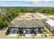 Aerial view of new townhome construction neighborhood with completed homes and green space at 716 Jamescroft Way # 28, Rolesville, NC 27571
