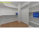 Spacious walk-in closet with ample shelving and hanging space, perfect for organization at 716 Jamescroft Way # 28, Rolesville, NC 27571