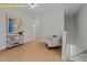 Stylishly staged hallway with modern art and cozy seating area; bright and inviting at 716 Jamescroft Way # 28, Rolesville, NC 27571