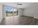 Living room featuring sliding glass doors to outside and dark wood look flooring at 716 Jamescroft Way # 28, Rolesville, NC 27571