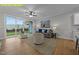 Cozy living room with sliding glass door, comfortable seating, stylish decor, and abundant natural light at 716 Jamescroft Way # 28, Rolesville, NC 27571