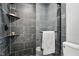Modern bathroom featuring a tiled shower with glass enclosure at 7708 Falcon Rest Cir, Raleigh, NC 27615