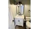 Well-lit bathroom featuring modern vanity, sink, toilet and fixtures with neutral colors at 7708 Falcon Rest Cir, Raleigh, NC 27615