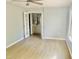 Bedroom with french doors leading to bathroom at 7708 Falcon Rest Cir, Raleigh, NC 27615
