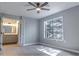 Bedroom with ceiling fan and view to bathroom at 7708 Falcon Rest Cir, Raleigh, NC 27615