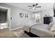 Stylish bedroom with wood floors, neutral walls, and an en-suite bathroom at 7708 Falcon Rest Cir, Raleigh, NC 27615