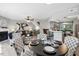Open floor plan with a dining area, living area, and kitchen island at 7708 Falcon Rest Cir, Raleigh, NC 27615