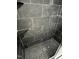 Stylish shower with modern black and marble tiling and a glass door at 7708 Falcon Rest Cir, Raleigh, NC 27615