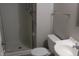 Modern bathroom with walk-in shower, vanity, and toilet, offering comfort and functionality at 7746 Kingsberry Ct, Raleigh, NC 27615