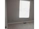 Bedroom featuring neutral carpet and a window with blinds at 7746 Kingsberry Ct, Raleigh, NC 27615