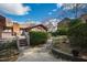 Lovely landscaped backyard and deck area with mature trees and manicured bushes in a park-like setting at 817 Glen Eden Dr, Raleigh, NC 27612