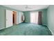 Bedroom with seafoam-green walls, carpet and curtains at 817 Glen Eden Dr, Raleigh, NC 27612