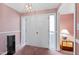 Inviting foyer with neutral walls, classic lighting fixture, and convenient coat closet at 817 Glen Eden Dr, Raleigh, NC 27612