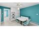 Bright and inviting kitchen with white table, chairs, cabinetry, and modern appliances at 817 Glen Eden Dr, Raleigh, NC 27612