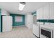 Spacious laundry room with modern appliances and ample storage, providing convenience and organization at 817 Glen Eden Dr, Raleigh, NC 27612