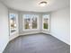 Bright bedroom with a bay of windows offering views of the neighborhood at 9100 Palm Bay Cir, Raleigh, NC 27617