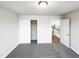 Simple bedroom with neutral carpet and a view to the landing and stairs at 9100 Palm Bay Cir, Raleigh, NC 27617