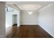 Dining area featuring hardwood floors and wainscoting at 9100 Palm Bay Cir, Raleigh, NC 27617
