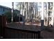 Backyard and wooded area with trees visible from the back deck at 106 Weatherstone Dr # B, Chapel Hill, NC 27514