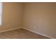 An empty bedroom with light wood floors and neutral paint at 106 Weatherstone Dr # B, Chapel Hill, NC 27514
