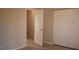 Hallway with a closet and an open door at 106 Weatherstone Dr # B, Chapel Hill, NC 27514