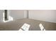 Large bright bedroom with neutral carpet and natural sunlight at 112 Pisgah St, Sanford, NC 27330