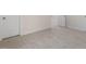 This spacious bedroom has neutral carpet and two doorways at 112 Pisgah St, Sanford, NC 27330