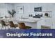 Designer kitchen featuring an island with bar seating, granite countertops, and stainless appliances at 112 Pisgah St, Sanford, NC 27330