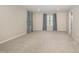 Spacious bonus room with neutral carpet and stylish window treatments at 121 Mason Oaks Dr, Wake Forest, NC 27587