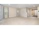 Bright living room featuring neutral walls, recessed lights, plush carpet, and ample natural light at 121 Mason Oaks Dr, Wake Forest, NC 27587