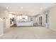 Open concept living space connects kitchen, dining, and living areas at 121 Mason Oaks Dr, Wake Forest, NC 27587