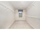 Walk-in closet with shelving and a window with a view at 121 Mason Oaks Dr, Wake Forest, NC 27587