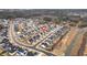Aerial view of a residential community featuring charming homes and well-planned street layout at 1530 Armscroft Ln, Apex, NC 27502