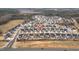 An aerial shot of a neighborhood showcasing attractive homes and green spaces at 1530 Armscroft Ln, Apex, NC 27502