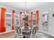 Cozy dining area bathed in natural light, complemented by vibrant curtains and stylish decor at 1530 Armscroft Ln, Apex, NC 27502