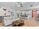 Spacious open-concept space connecting the living room, kitchen, and dining areas at 1530 Armscroft Ln, Apex, NC 27502