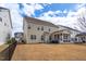Charming home featuring a screened porch, patio, and well-maintained lawn, enhancing outdoor living at 1530 Armscroft Ln, Apex, NC 27502