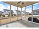 Inviting screened porch overlooking the backyard, perfect for outdoor relaxation and entertaining guests at 1530 Armscroft Ln, Apex, NC 27502