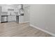 Modern kitchen features stainless steel appliances, granite counters, white cabinets, and a subway tile backsplash at 1706 Us Hwy 70A E, Hillsborough, NC 27278