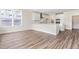 This kitchen is designed with white shaker cabinetry and stainless appliances at 1785 Birdhaven Ln, Wendell, NC 27591
