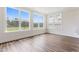 Spacious living room boasts many windows offering ample natural light at 1785 Birdhaven Ln, Wendell, NC 27591