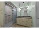 Clean bathroom features a tiled shower with glass door and a neutral vanity at 1837 Shamrock Dr, Burlington, NC 27215