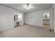 Spacious bedroom with a vanity area and a partial view into the attached bathroom at 1837 Shamrock Dr, Burlington, NC 27215