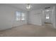 Bright living room featuring a ceiling fan and natural light at 1837 Shamrock Dr, Burlington, NC 27215
