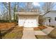 Outbuilding featuring double doors and sidewalk at 1837 Shamrock Dr, Burlington, NC 27215